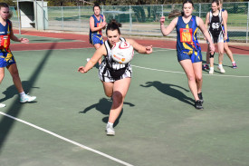 Maryborough Rovers’ Kaitlin Scott tries to get the ball before it crosses the line. 