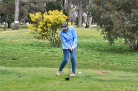 Cheryl Baker tees off at the 15th hole.