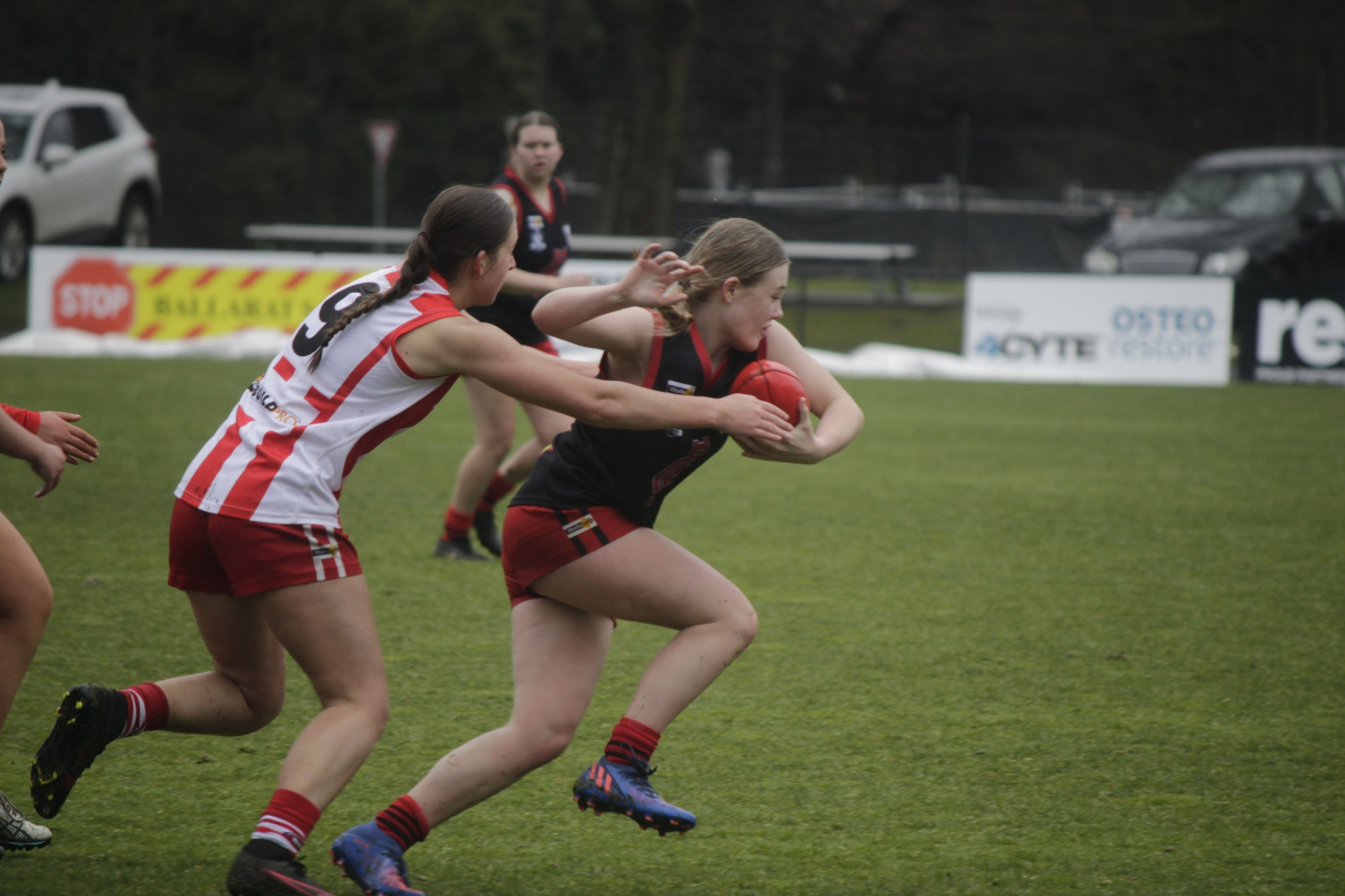 Carisbrook Lady Redbacks under 18 player Tiani Jardine tried to break through in the team’s elimination final against Ballarat Swans on Sunday, but it was not enough to prevent a 52-point loss.