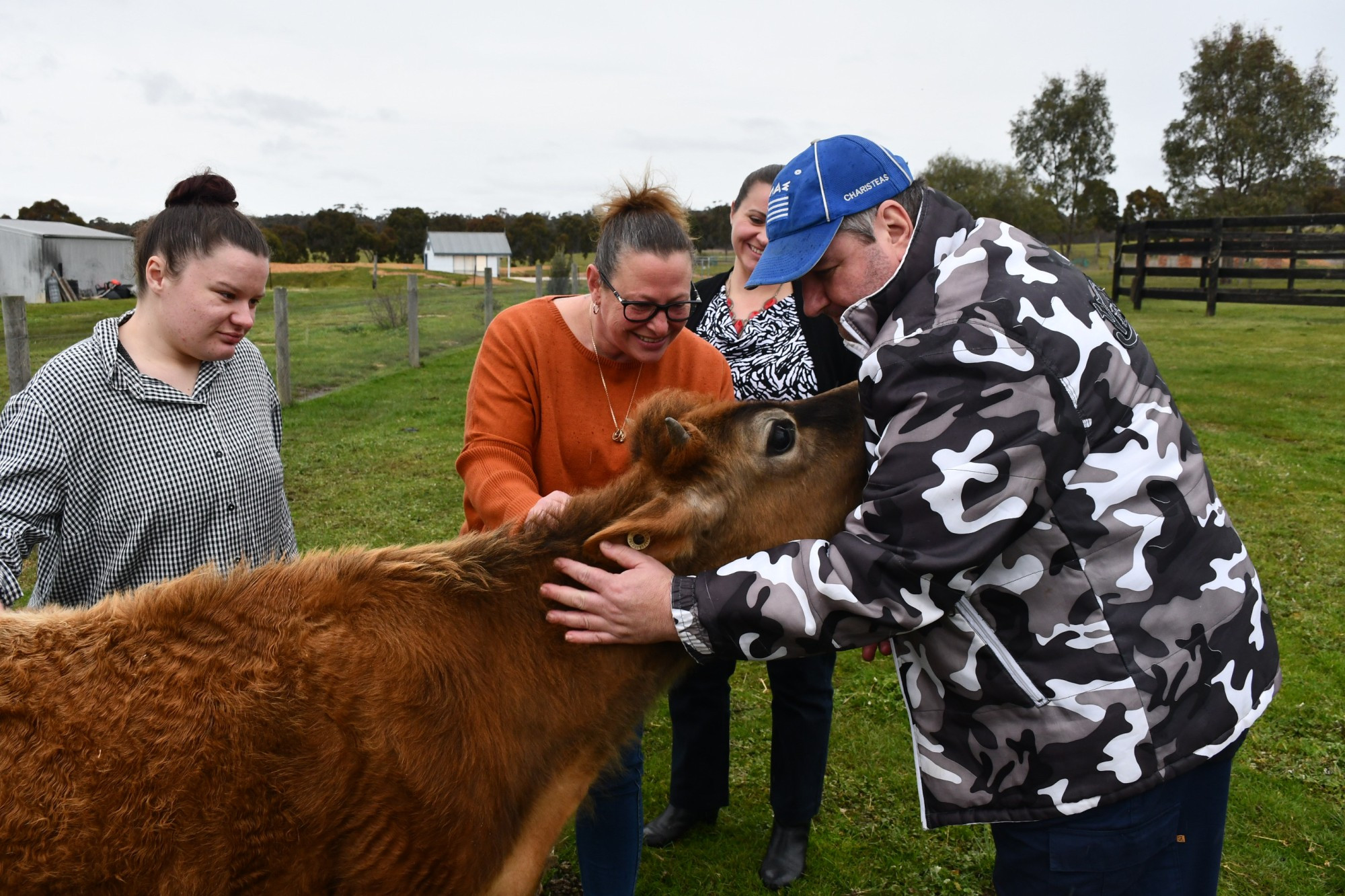 Wattle Tree Country Retreat is one of two local service providers to be nominated for a Victorian Community Achievement Award, to the delight of owner Chelsea Thompson (second from left) office manager Elisha Curnow and clients Shania (left) and John.