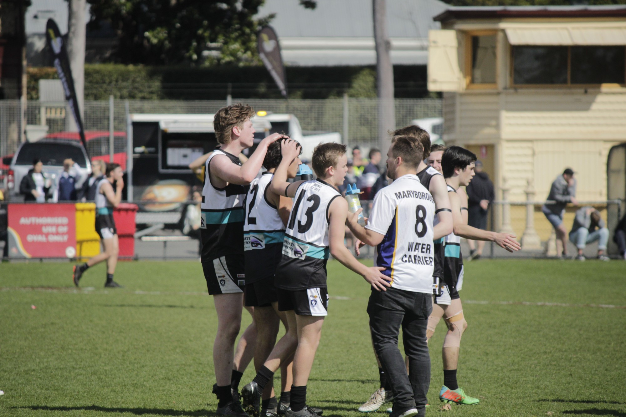 Maryborough under 18 players celebrate Liam Freeman’s third quarter goal.