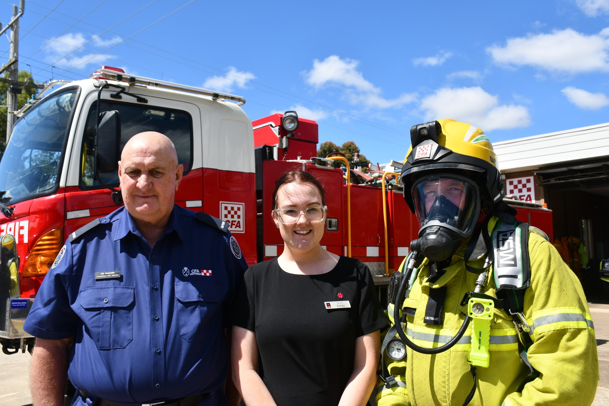 Carisbrook Fire Brigade Captain Ian Boucher, NAB branch manager Emily Grogan and Carisbrook Fire Brigade First Lieutenant Jamie Herd with the newly equipped fire truck.