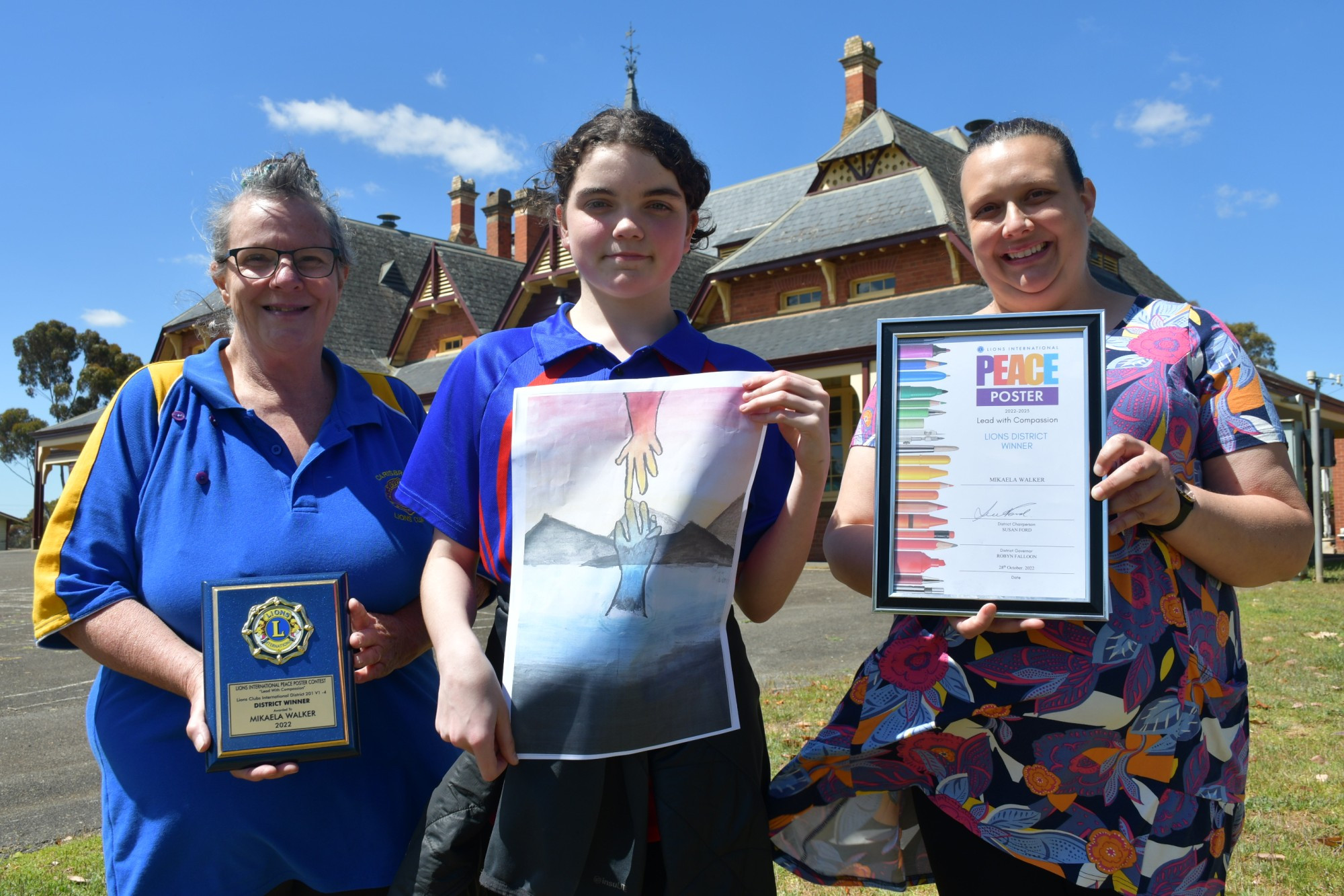 Carisbrook Lions Club peace poster coordinator Katinka Hilder presented Avoca Primary School’s Mikaela Walker with awards for her poster last week, alongside school principal Jacinta Dellavedova.