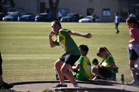 Annika Ross prepares for her shot put throw. 