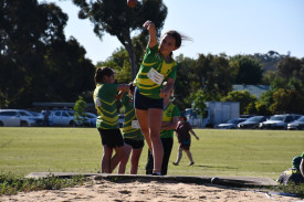 Taylah Schodde puts all her effort into a good throw in shot put.