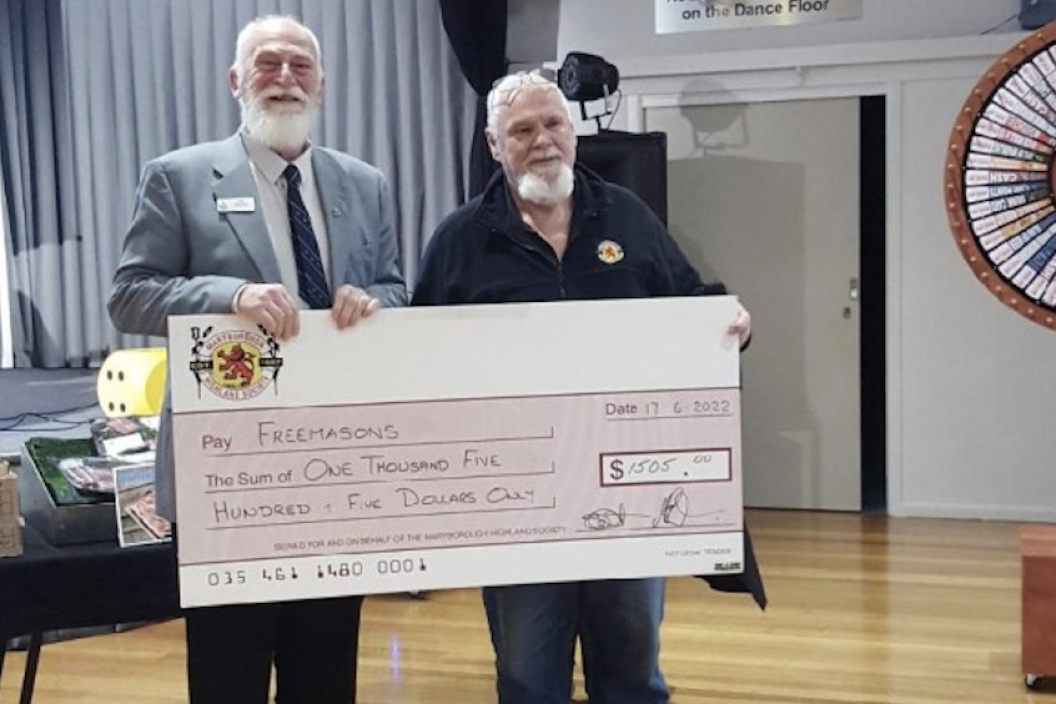 Maryborough Lodge secretary Colin Mason received the cheque to support the scholarships program from Highland Society chairman Bruce Kaye.