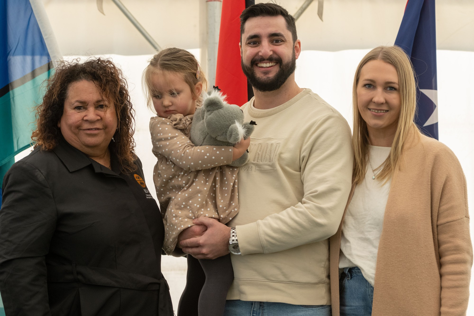 Maryborough Police First Constable Isaac Brewster (centre), was recently presented with the Aboriginal Employment Award by BDAC CEO Raylene Harradine and supported by daughter Harriet and fiancé Melanie Johnson.