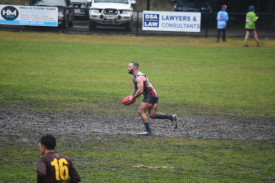  Avoca’s Joel Antonio tries to find a way out of the mud. 260722 13