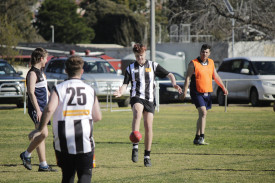 Tyler Botheras gets it out of the defensive zone. 