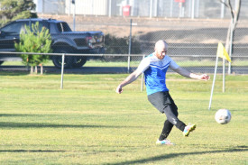 Adam Hayes takes a kick.