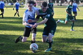 Riley Gardam competes hard for the ball.