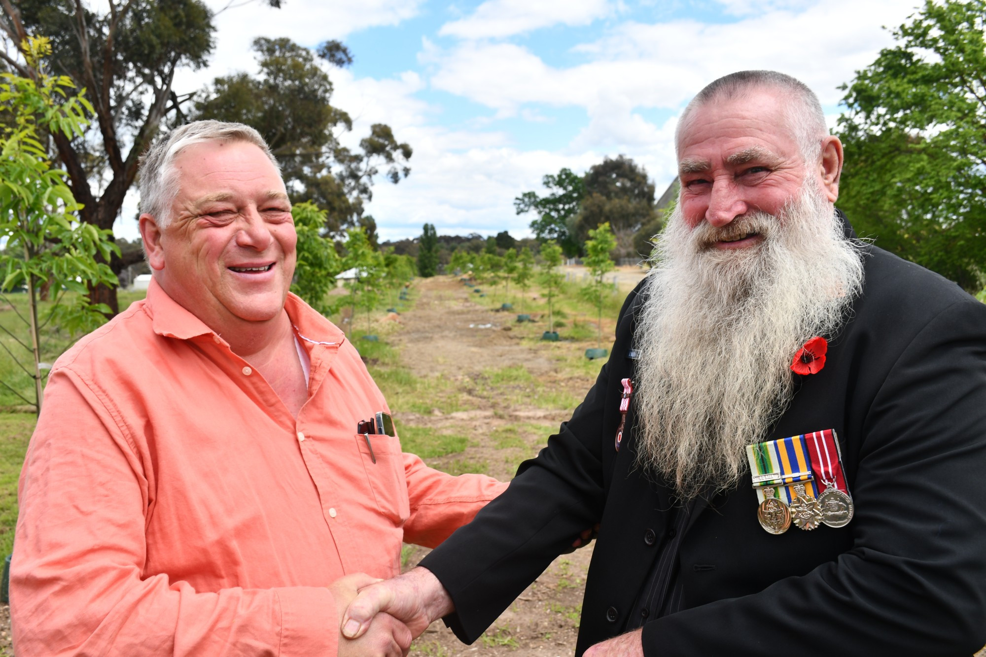 Talbot Action Inc’s Graham Miller and Talbot RSL sub branch’s Skip Lynch congratulate each other on their efforts restoring the Avenue of Honour.