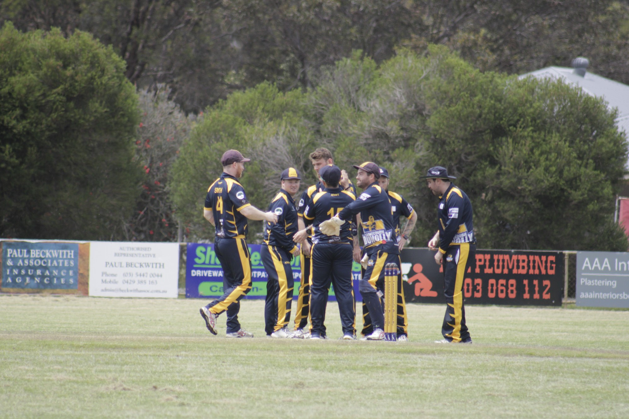 Laanecoorie Dunolly players celebrate the wicket of Kane Shepherd in their game against Colts Phelans.