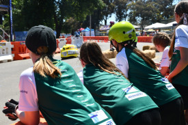 Students and onlookers cheered on as the track events progressed.	