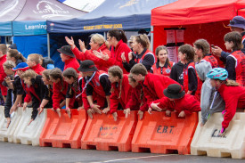 Carisbrook Primary Schools students cheer on their team mate.