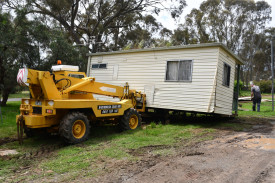 Cabins and caravans had been completely washed off their stumps.