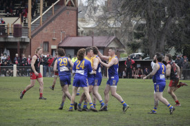 Harcourt’s Jed Rodda is mobbed after kicking the first goal of the second quarter. 