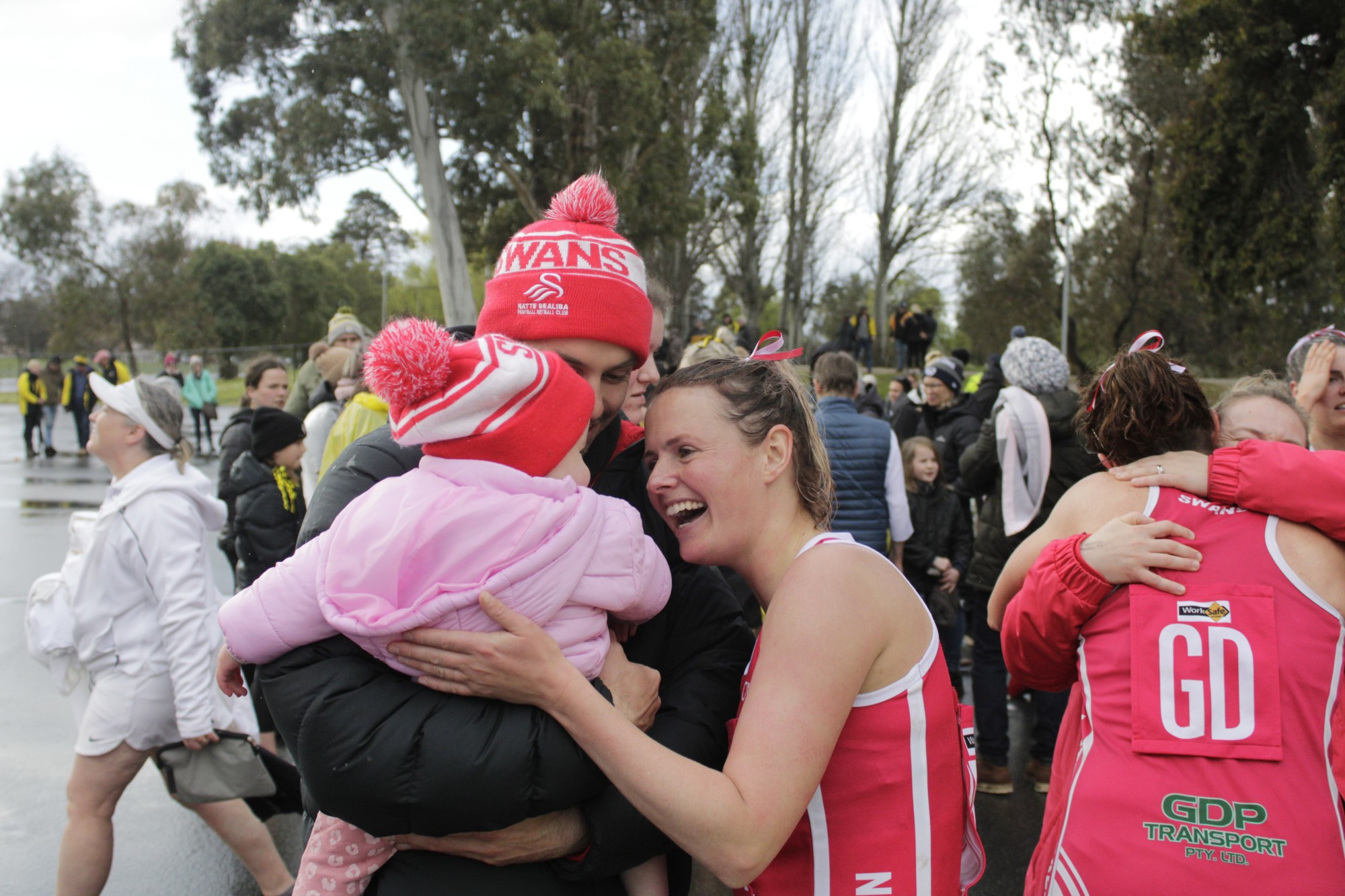 Natte Bealiba’s Anna Mortlock celebrates her A grade victory with husband Kurt and daughter Sophie.