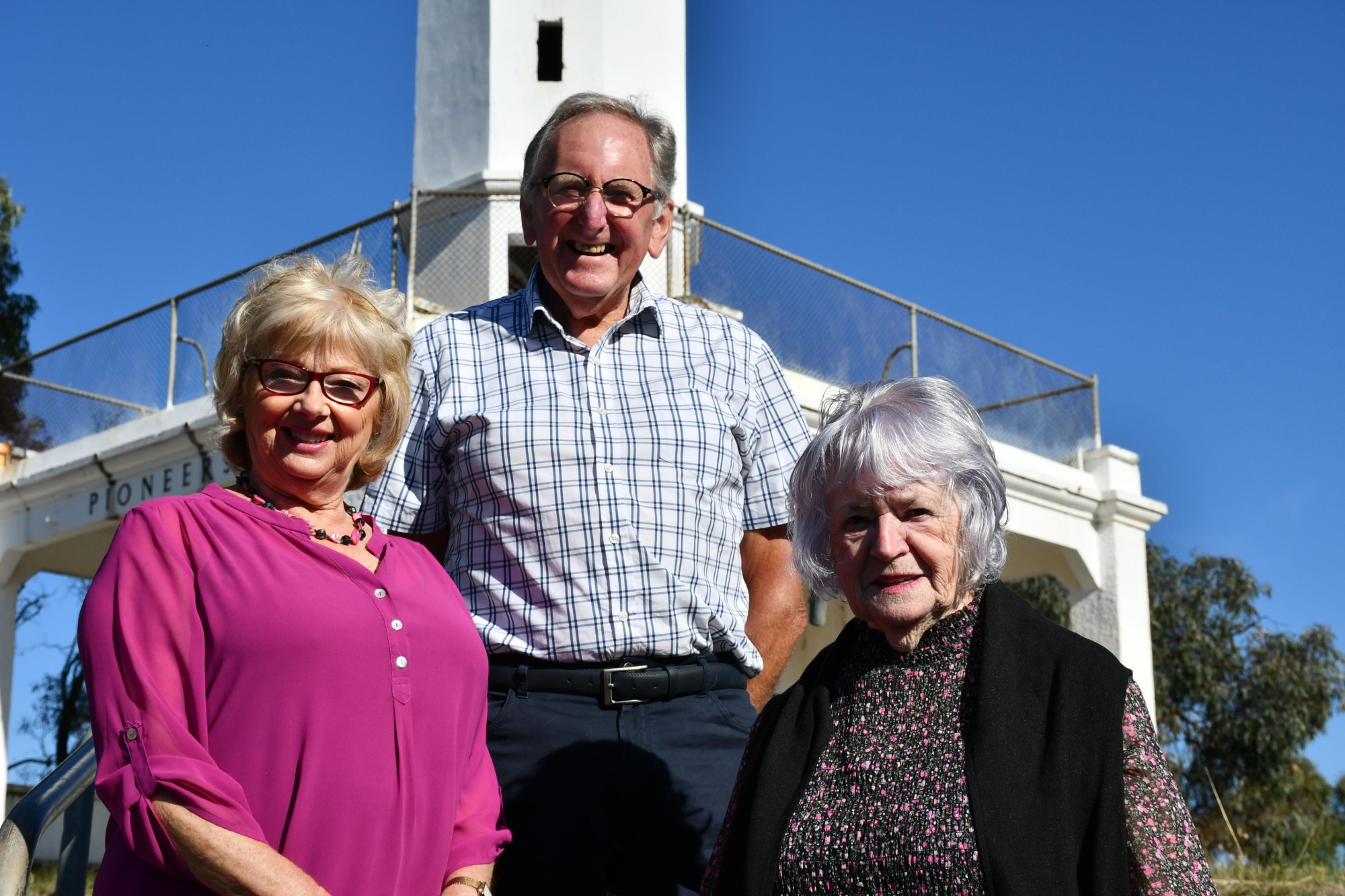 Maryborough Midlands Historical Society committee member Janice Digby-Beste (right) reflects her special connection with the Bristol Hill Tower — which her father helped build — alongside Central Goldfields Shire mayor Grace La Vella and councillor Geoff Lovett. Photo: 140423 06