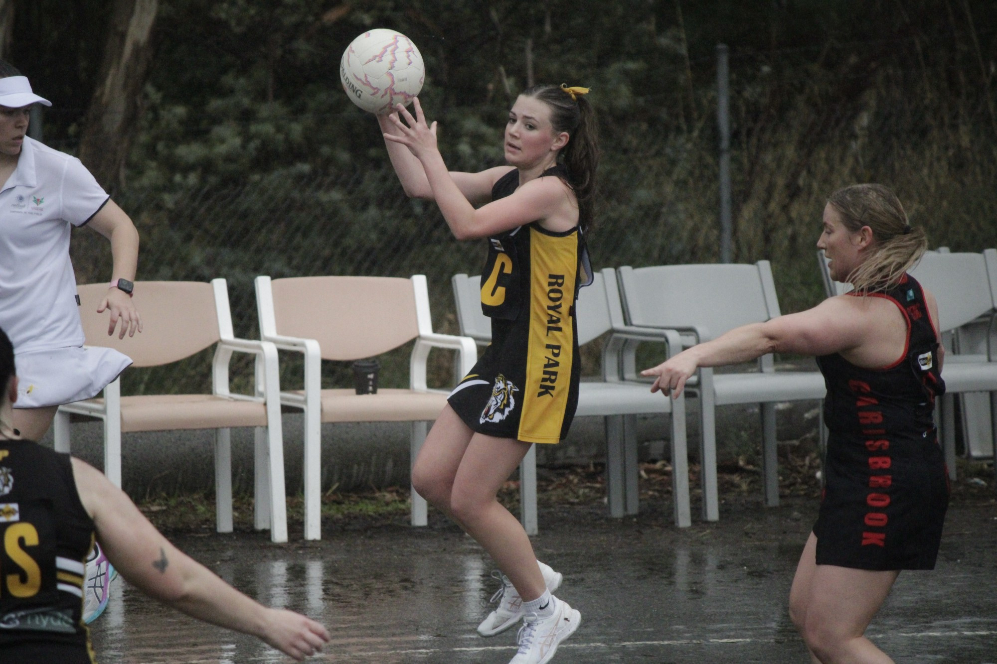 Royal Park’s Paige Walkley looks to keep the ball moving in their loss to Carisbrook. Photo: 180423 05