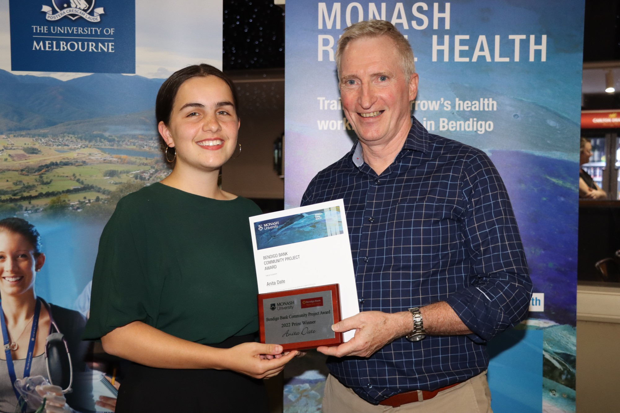 Medical student Anita Date receives her award for her community engagement during her Maryborough placement from Monash Rural Health Bendigo’s Associate Professor Dennis O’Connor.