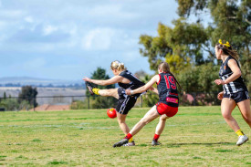 Olivia Butler lays a strong tackle for Carisbrook. Photo: 150823 15