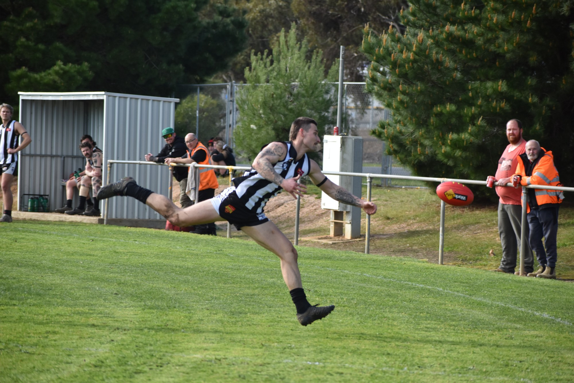 Senior Magpie captain Kieran Johns leaps for the ball. Photo: 220823 01