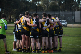 Royal Park senior players gather after their final match. Photo: 220823 28