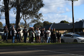 Royal Park supporters cheer on their A grade netball team for the final time. Photo: 220823 29