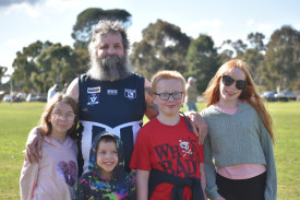 Glenn Blackman-Cole returned for one last game, more than 30 years after his debut, cheered on by his kids Acacia, Jason, Noah and Abbey. Photo: 220823 11