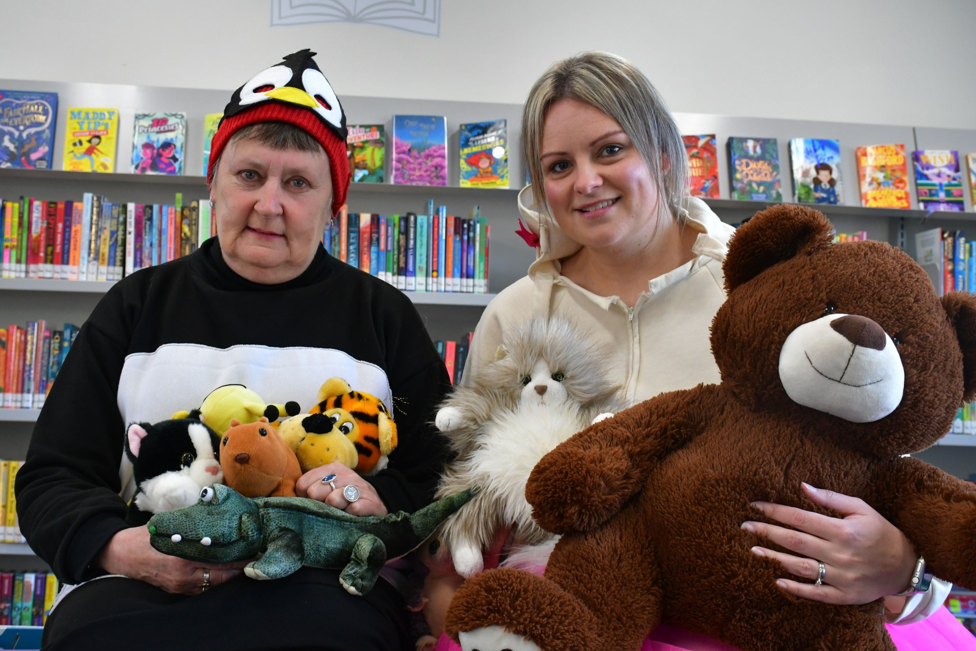 Maryborough Regional Library’s Maree Stephenson and Bec Clark will keep the toys entertained at tonight’s sleepover. Photo: 250823 01