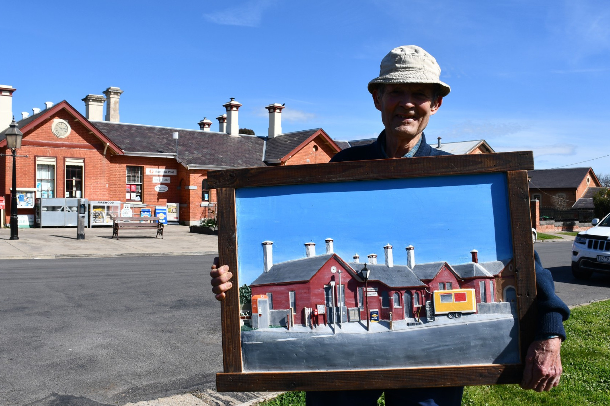 Bernie Crumpler with his bas-relief of the Talbot Post Office.