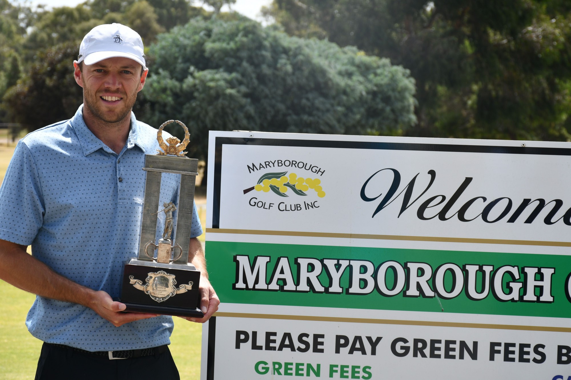 Chris Thomson with his trophy from the recent Ballarat district golf tournament. He's now followed that up with a berth in the Victorian Open. Photo: 030223 17