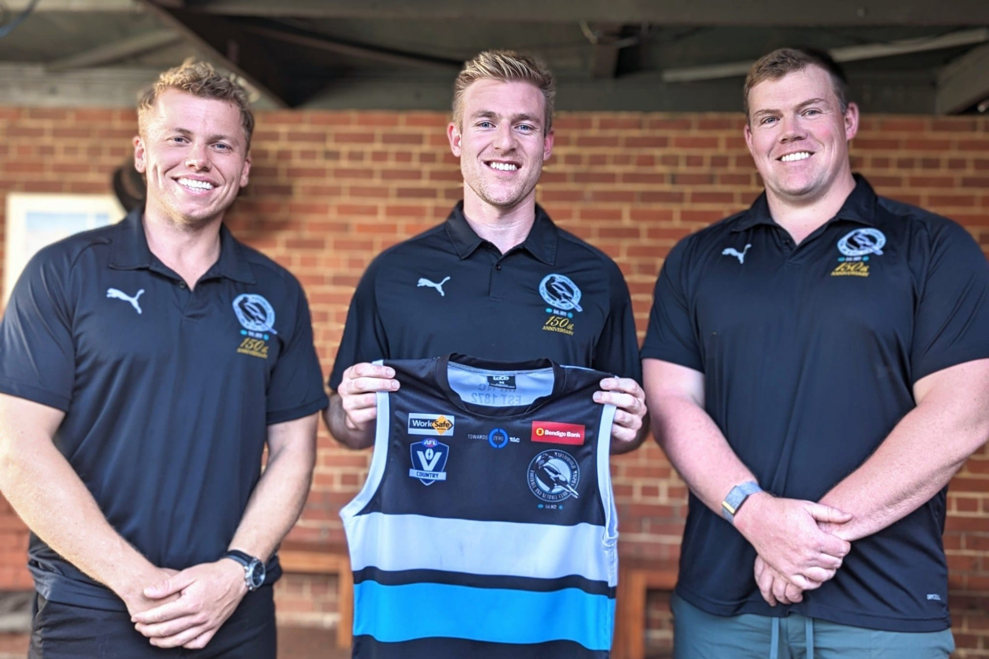 Joel Swatton (centre) was flanked by playing-coach Coby Perry (left) and senior assistant Matt Johnston (right) for the announcement of his move to Maryborough.