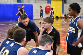 Maryborough Blazers Blue under 16 boys coaches Angus Cumming and Cameron Skinner address the team during a time-out against Deni Giants. Photo: 210223 16