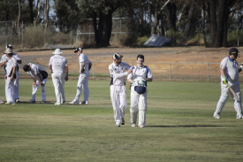 Clunes captain Aidan Thompson embraces Wagstaff following his century in a great act of sportsmanship. Photo: 210223 15