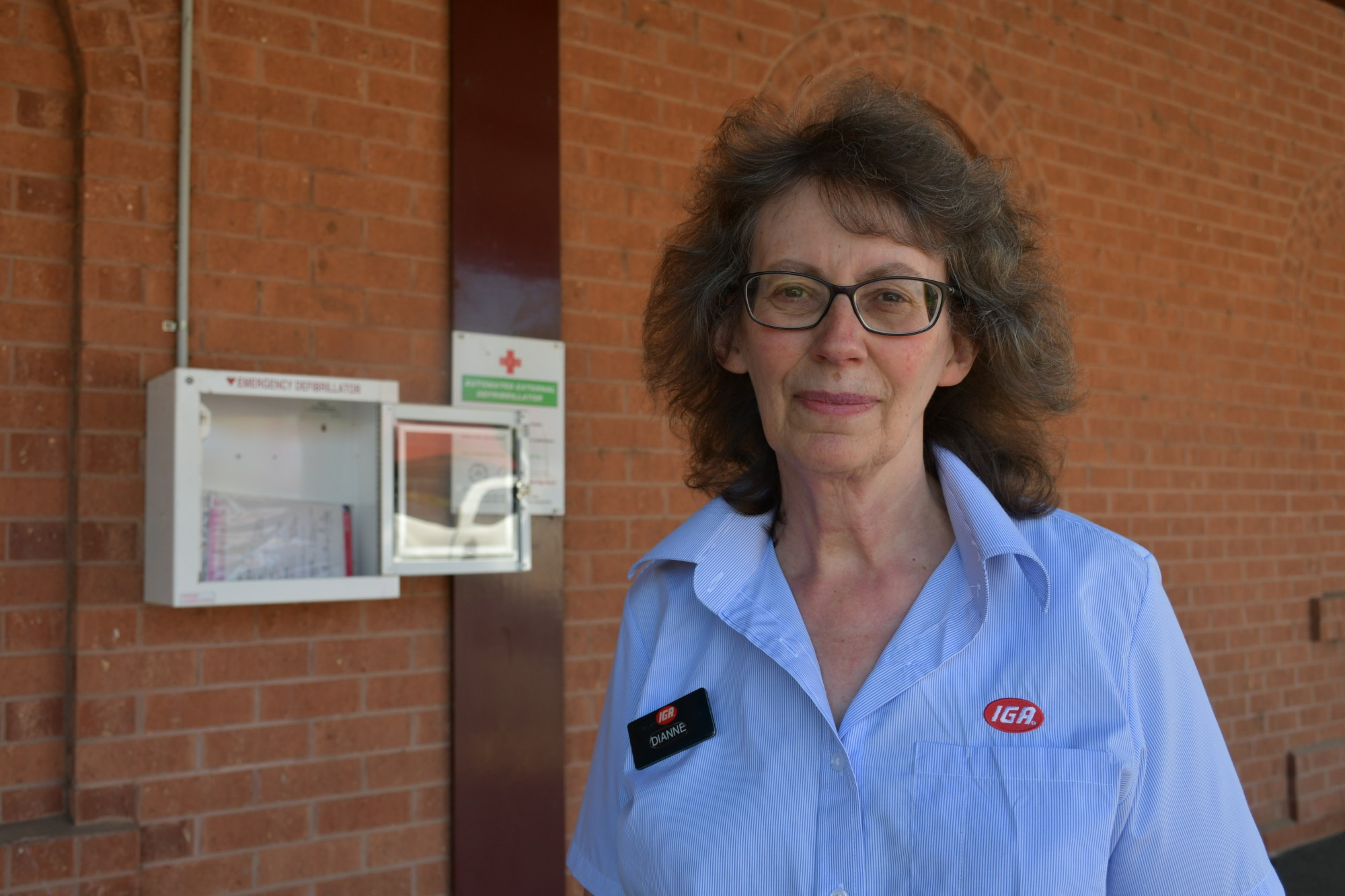 Clunes IGA owner Dianne Hill is disappointed that the Automated External Defibrillator placed outside the store was stolen last month.