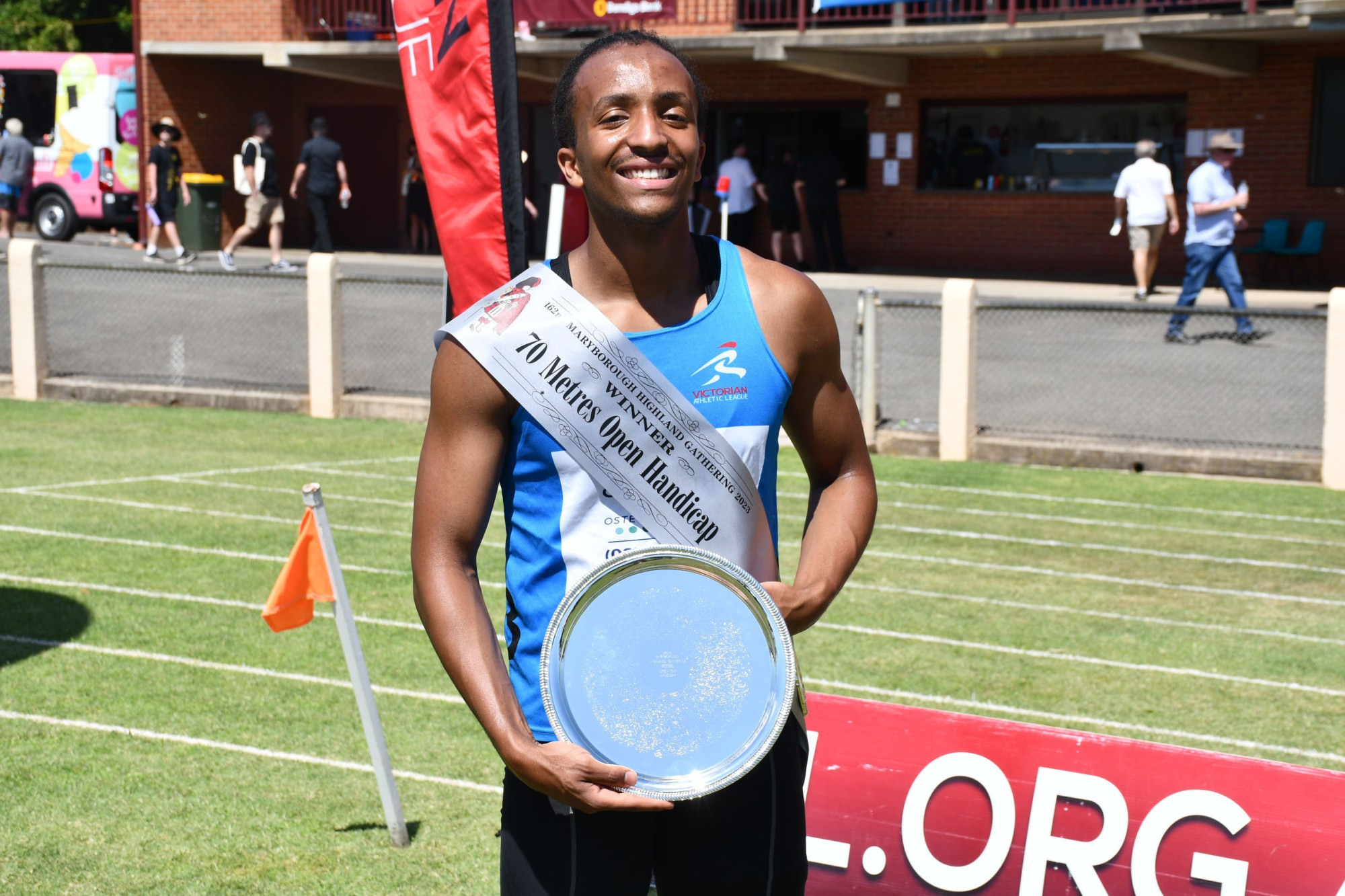 Endale Mekonnen celebrates his Maryborough Advertiser Open 70m title.