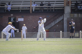 Samit Gohil looks to accelerate the run-rate in his innings of 49 for Laane. 