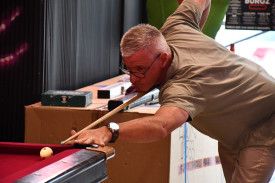 Rod McClean tries to play his shot out of the corner. Photo: 270123 35