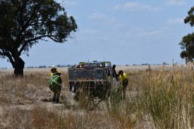 Forest Fire Management Crews arrived at the fire, equipping their protective clothing before assisting with the blaze. Photo: 270123 17