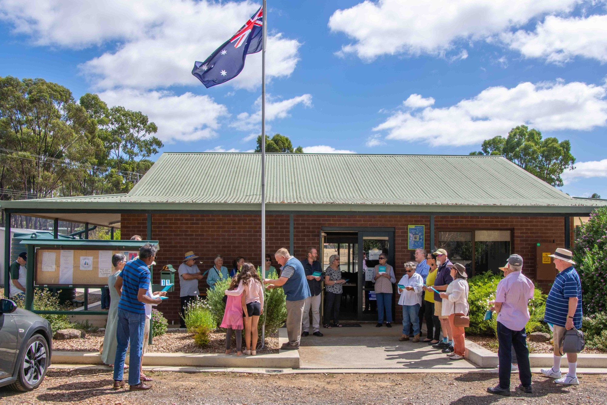 Around 25 Daisy Hill citizens gathered at their community centre for a flag raising ceremony, a speech by resident Bill Robinson and a barbecue lunch. Photo: 270123 23