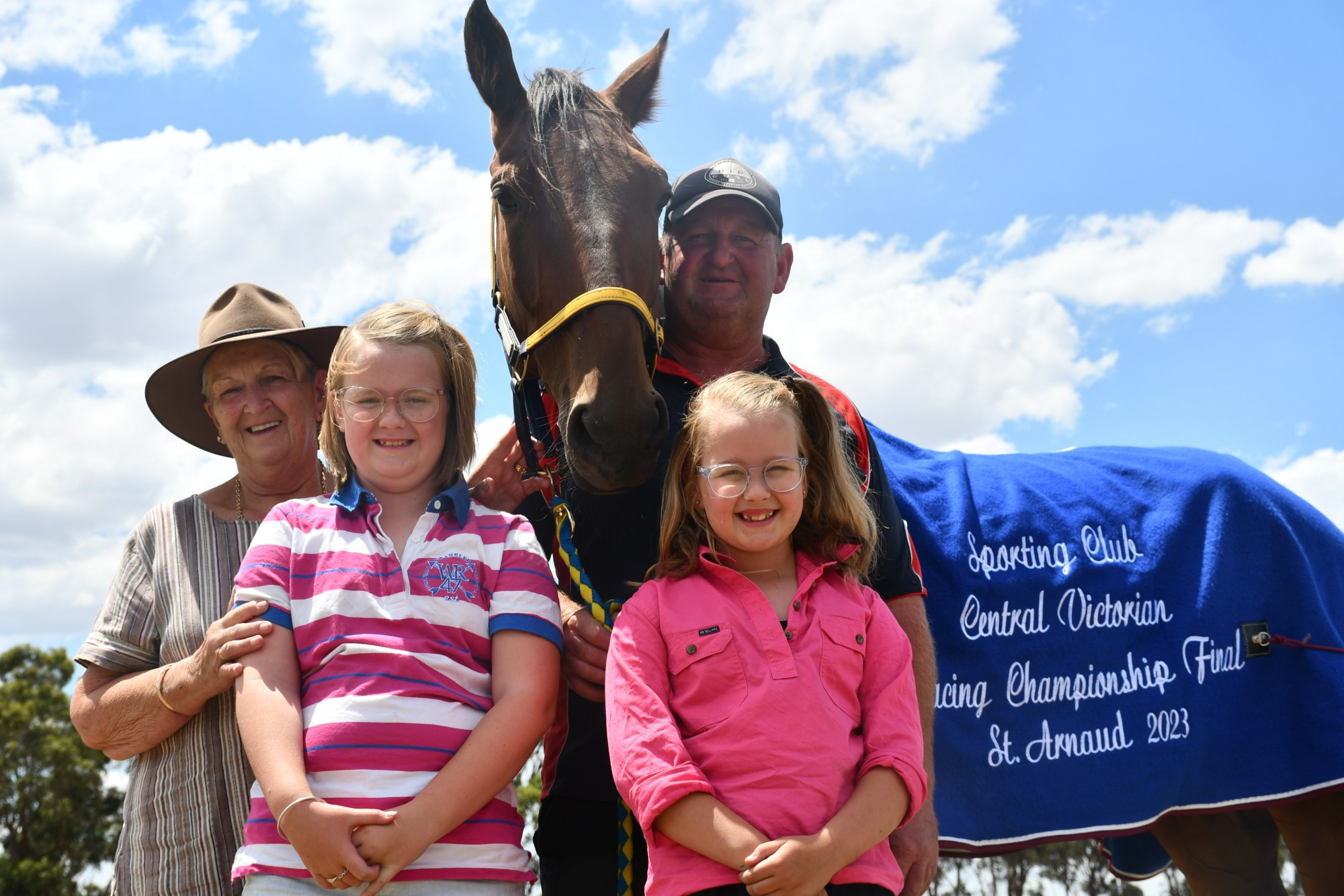 Helen and Tim Mortlock, flanked by Tim’s nieces Evie Williams and Josie Williams (front), with Double The Hunter after his emotional victory last Monday at St Arnaud. Photo: 310123 26