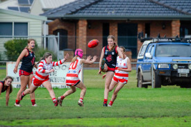 Olivia Rogers sends one forward for Carisbrook under 16s. Photo: 140723 08