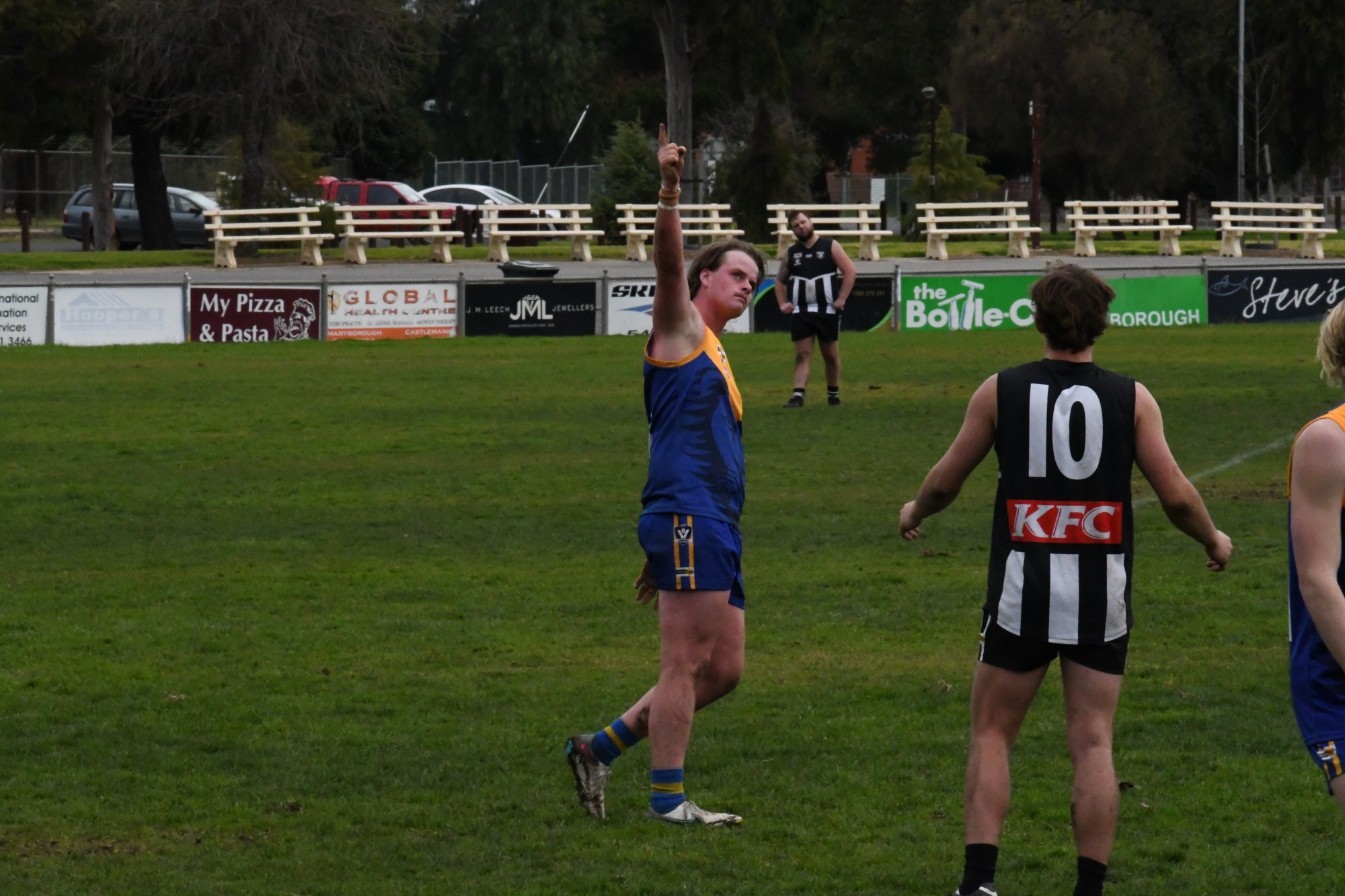 Thomas Walters salutes as he puts through a goal for Harcourt. Photo: 180723 05