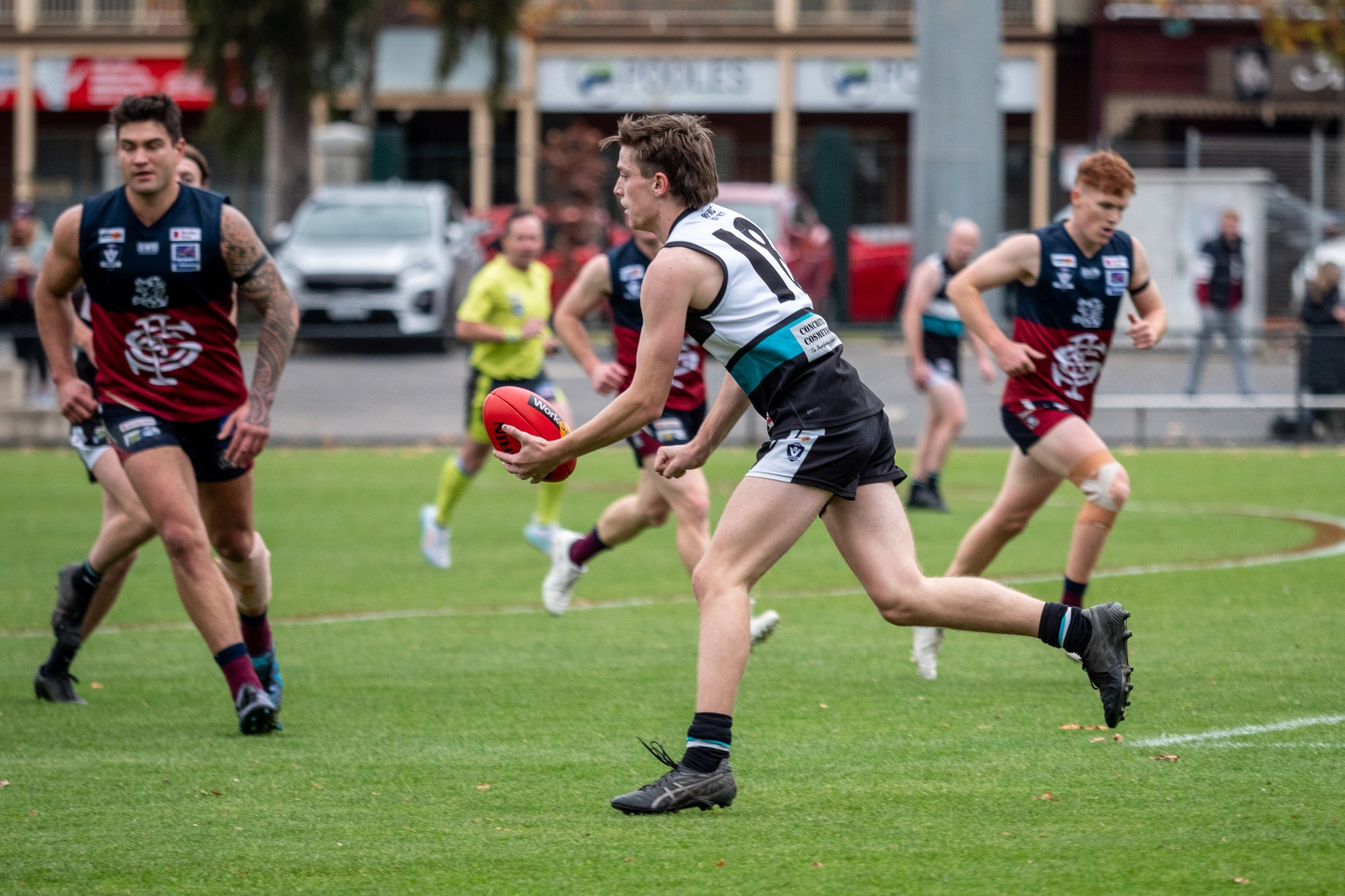 Maryborough under 18 captain Aidan Medlyn looked to dish off a handball in last week’s loss to Sandhurst.