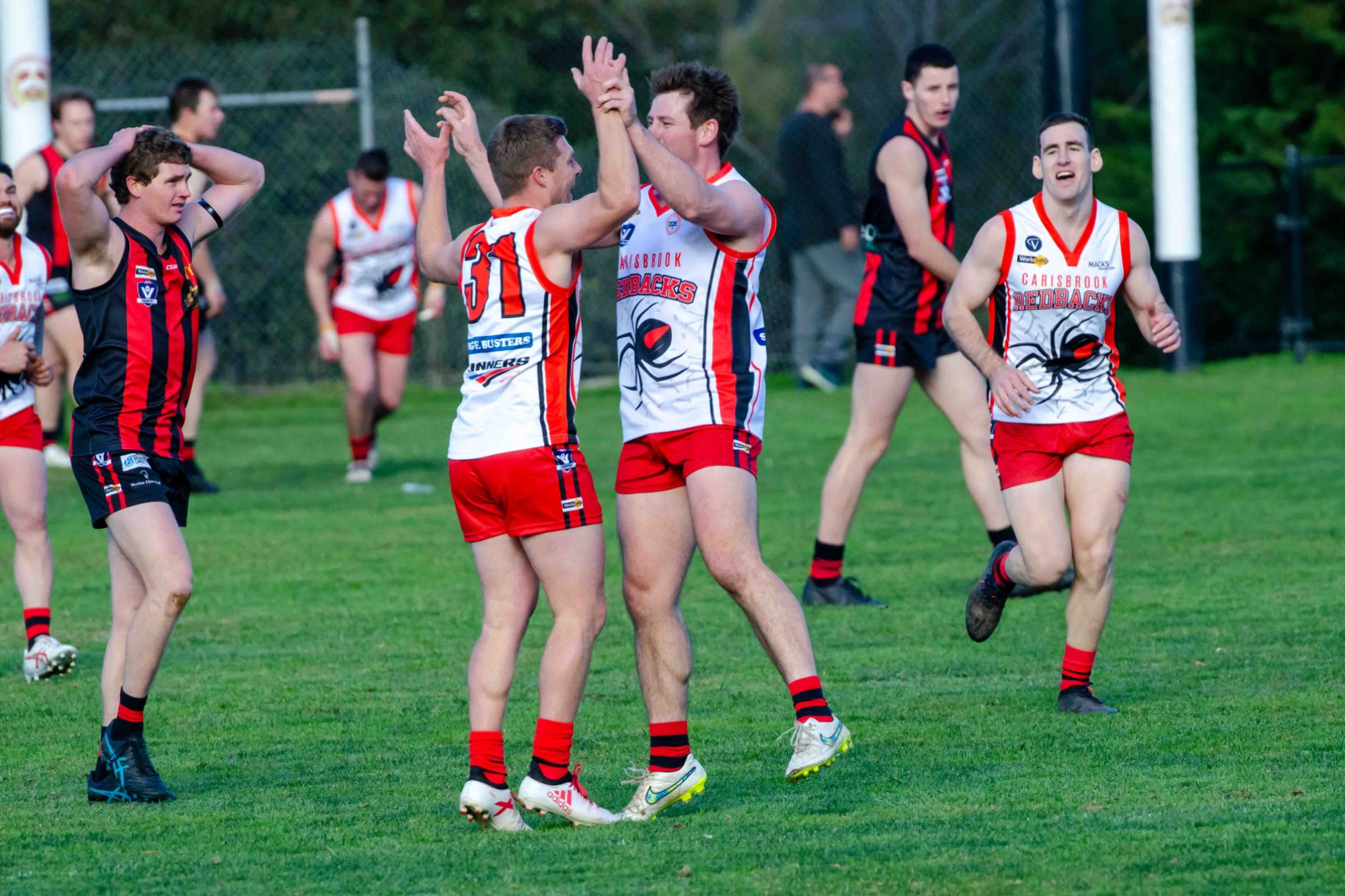 Nathan Curtis celebrates a goal for Carisbrook. Photo: 200623 15
