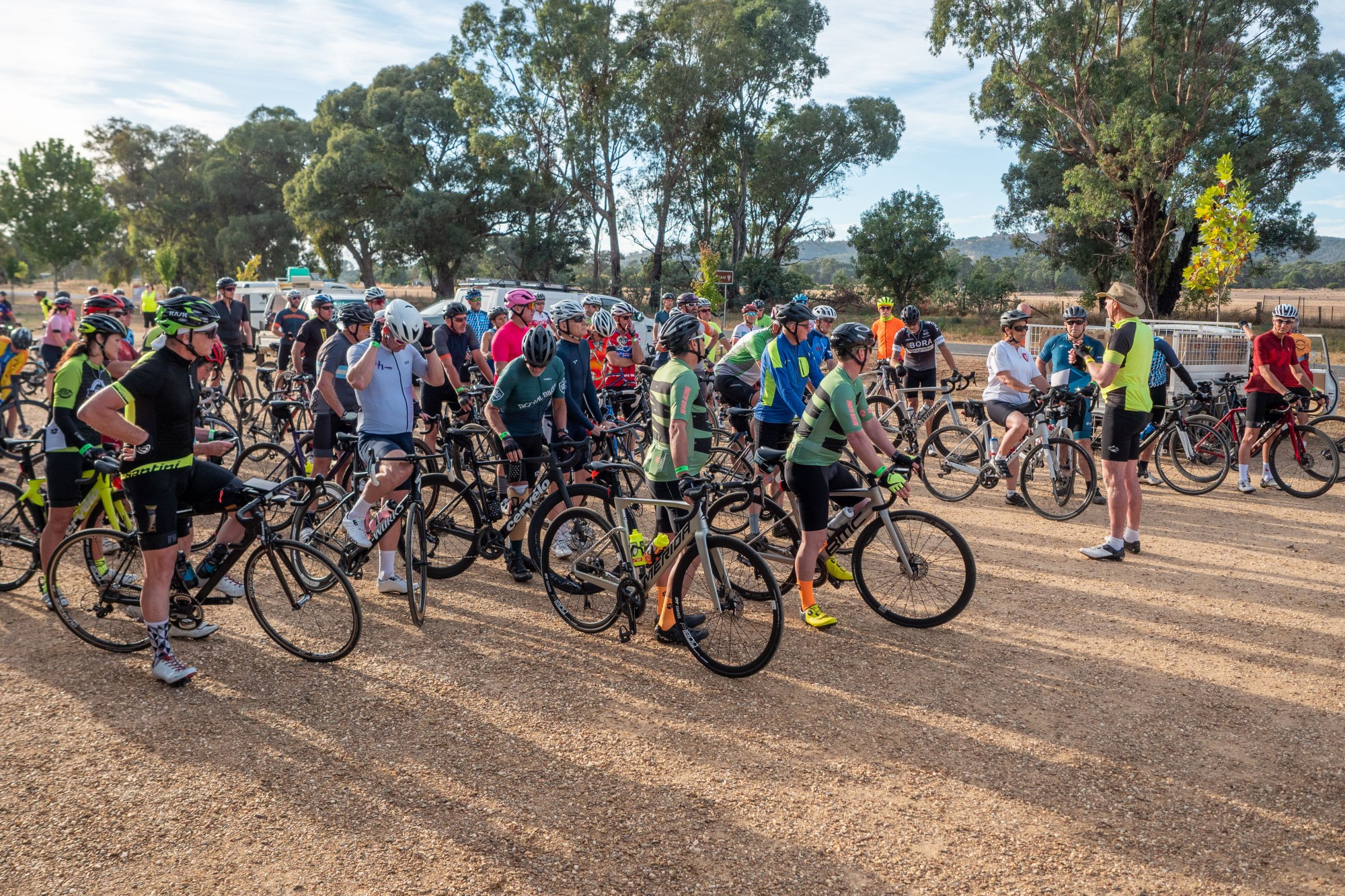 Riders gather for the briefing before hitting the road. Photos: Daryl Groves. Photo: 240323 17