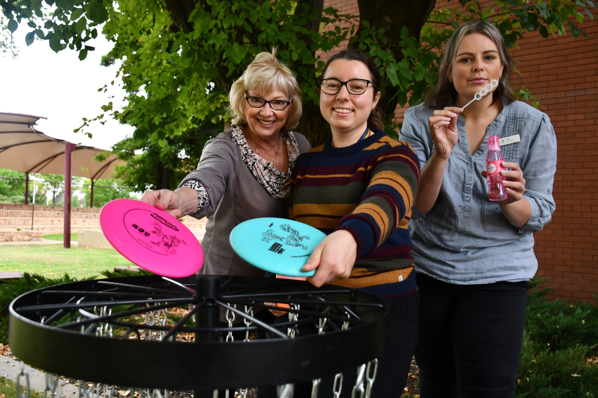 Central Goldfields Shire youth worker Gemma Simpson, mayor Grace La Vella and Maryborough Regional Library library officer Bec Clark tested out some of the activities on offer during the upcoming school holiday program. Photo: 280323 11