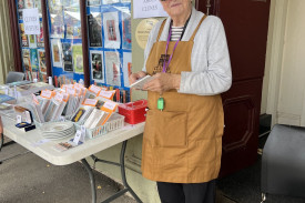 Clunes Museum curator Dot Keller at the organisation’s stall. Photo number: 280323 03